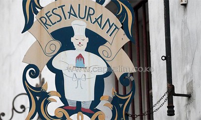 France is considering banning establishments from calling themselves restaurants if meals are not made from scratch by in-house chefs/AFP
