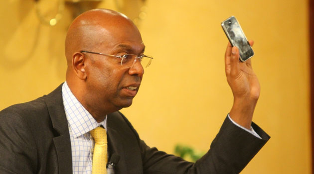 Safaricom CEO Bob Collymore says this is out of the more than Sh24 billion that has been deposited into customers' M-Shwari accounts/FILE