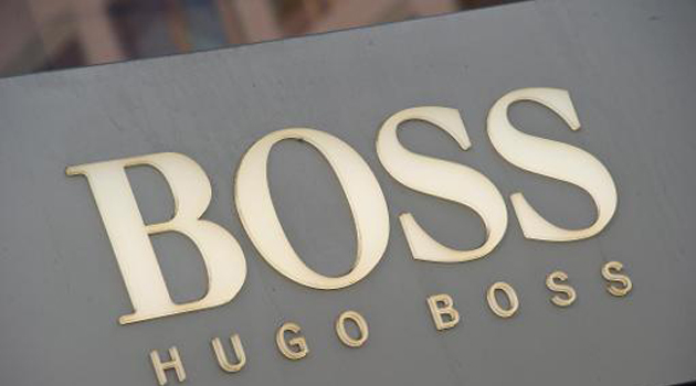 Hugo Boss sees higher sales, earnings after record 2013