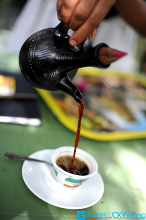 Habesha Restaurant in Nairobi Kenya photographed by Susan Wong 2012 - pouring coffee
