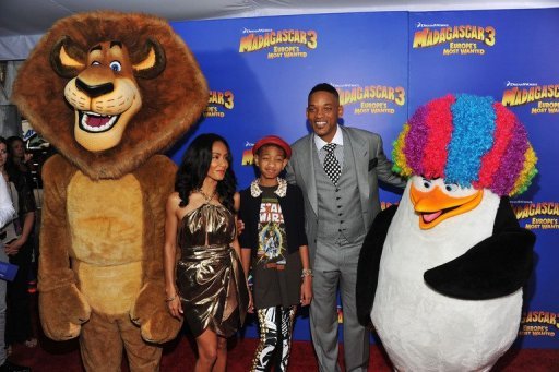 Jada Pinkett Smith, Willow Camille Reign and Will Smith attend the "Madagascar 3: Europe's Most Wanted" New York premiere at Ziegfeld Theatre on June 7 in New York City. "Madagascar 3: Europe's Most Wanted" and "Prometheus" leapfrogged a fairy tale to take the top spots in the North American box office charts over the weekend, industry estimates showed. (AFP Photo/Larry Busacca)