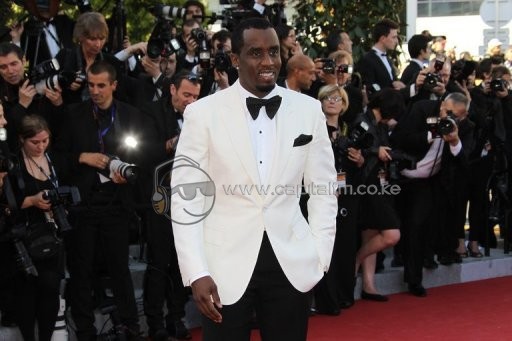 Hip-hop icon and fashion mogul Sean "Diddy" Combs, pictured in May 2012, suffered "multiple injuries" including to his neck and collarbone in a car crash in Beverly Hills, a spokeswoman for the star said Thursday. 