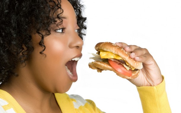 Woman_Eating_page-bg_19561-610x381