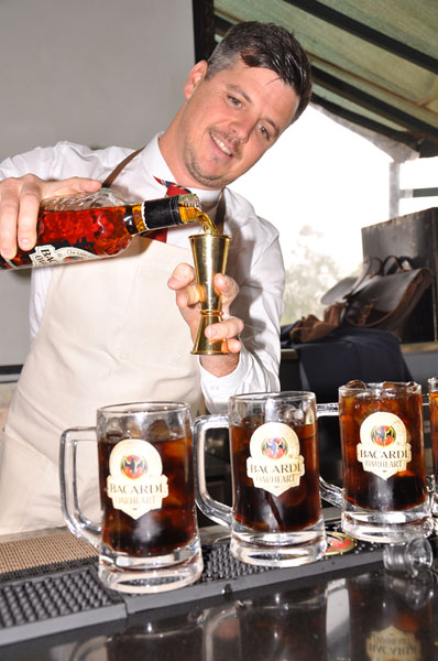 Richard Irwin  demonstrates how to make Oak and Cola cocktail using Bacardi Oakheart spiced rum during the Bacardi mixology training session for bar owners and bartenders.