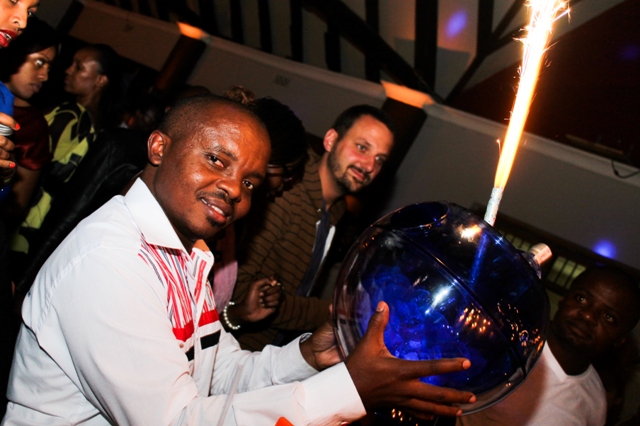 Nicholas Mtinda Key Accounts Manager EABL recieving his Ciroc in Style.