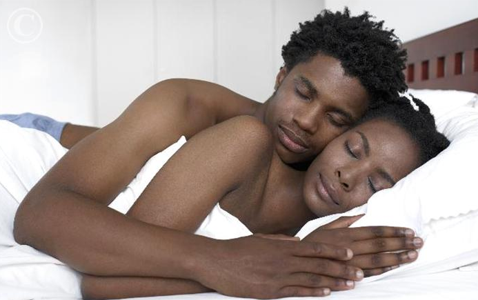 black couple sleeping