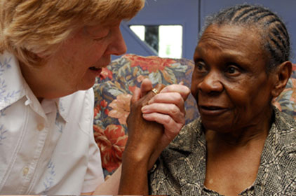 caucasian-carer-and-black-lady-with-dementia