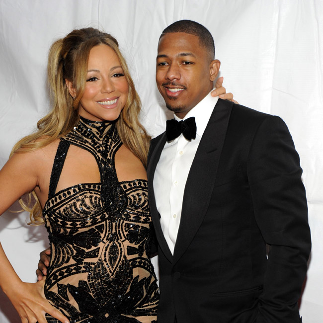 Mariah Carey gives husband Nick Cannon a big kiss at the 2012 BET Honors in Washington DC.