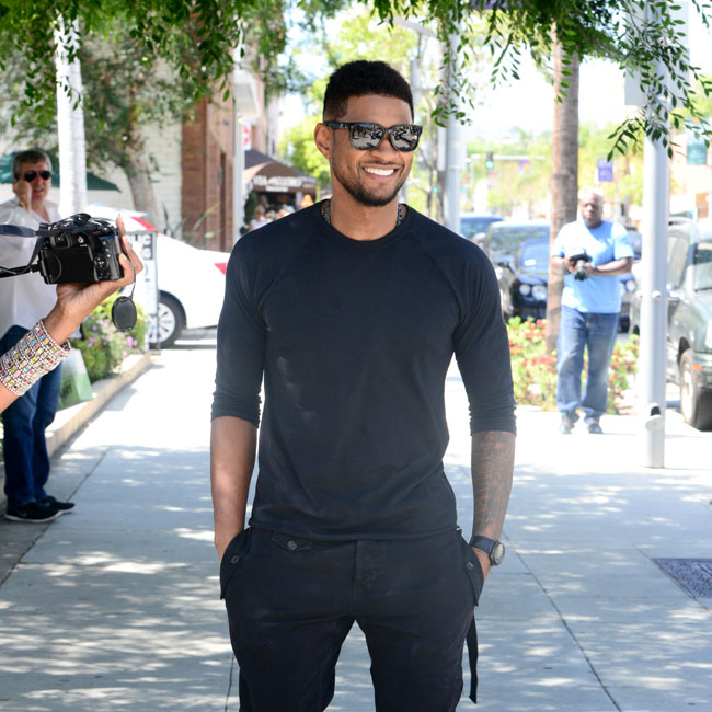 Usher leaving lunch at Via Aloro in Beverly Hills