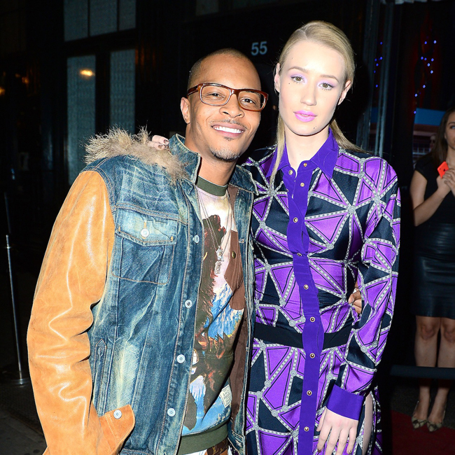 Iggy Azalea performs with T.I. in NYC wearing a  floor length purple gown