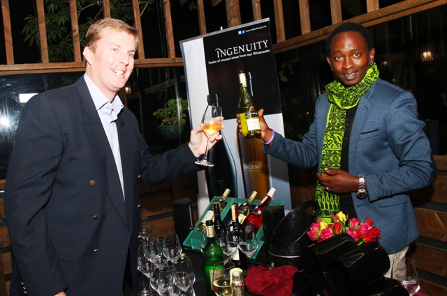 Richard Lord (GM North East Africa  for Distell ) pose with Eric Wainaina the newly appointed Nederburg Brand Ambassador   during  Nederburg's 'Meet The Taste Makers' event at Tokyo Japanese Restaurant