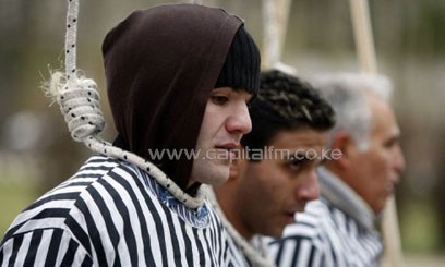 Activists of the Iranian Resistance simulate death by hanging as they demonstrate on January 22, 2008 in Berlin/AFP