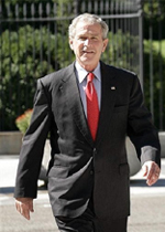 Bush signs bailout, Senators hopeful