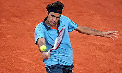Federer savours French Open title