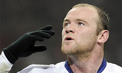 Rooney inspires United win
