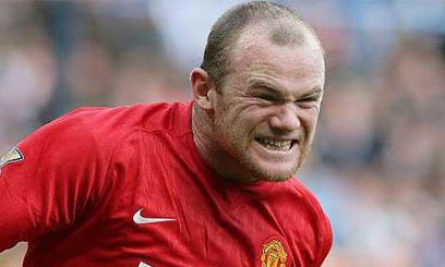 Rooney and Rio back in training