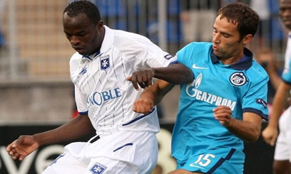 Oliech hangs international boots