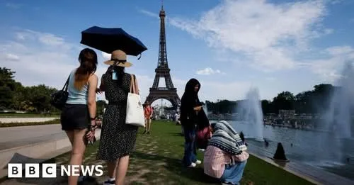 Half of France under red heat alert as alcohol banned at street music festival
