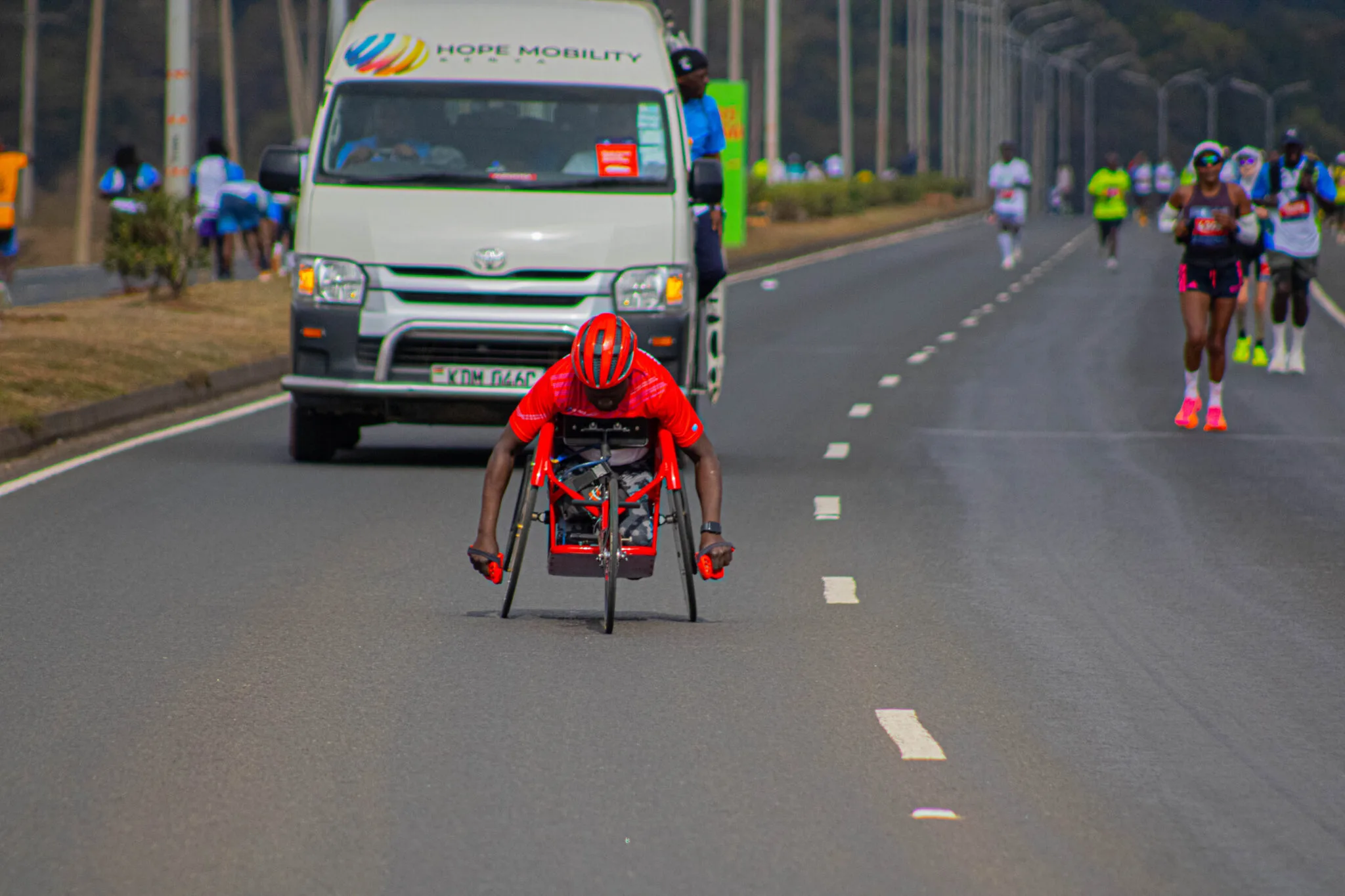 South Sudan-born paraplegic raises millions in historic race at StanChart Marathon