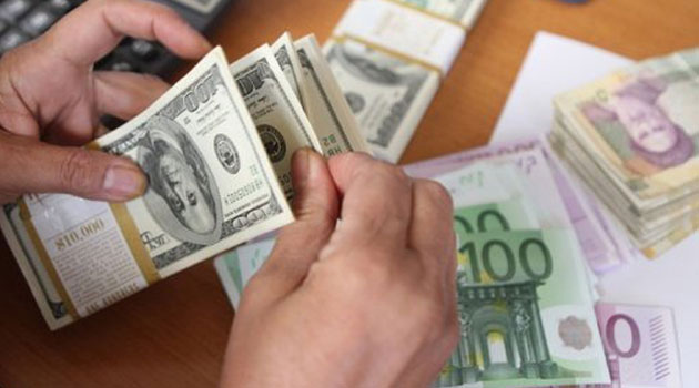 U.S. dollar retreats amid weak private payrolls