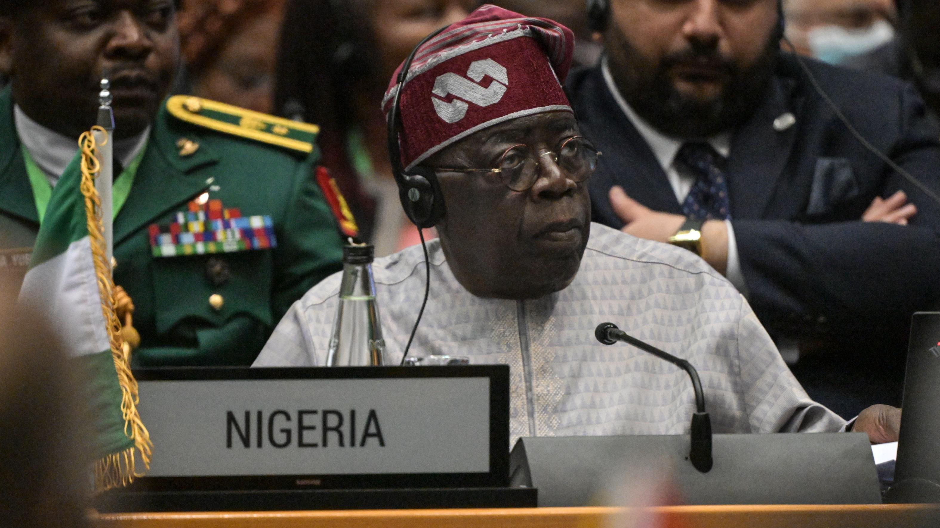 Nigerian president suspends minister over financial scandal