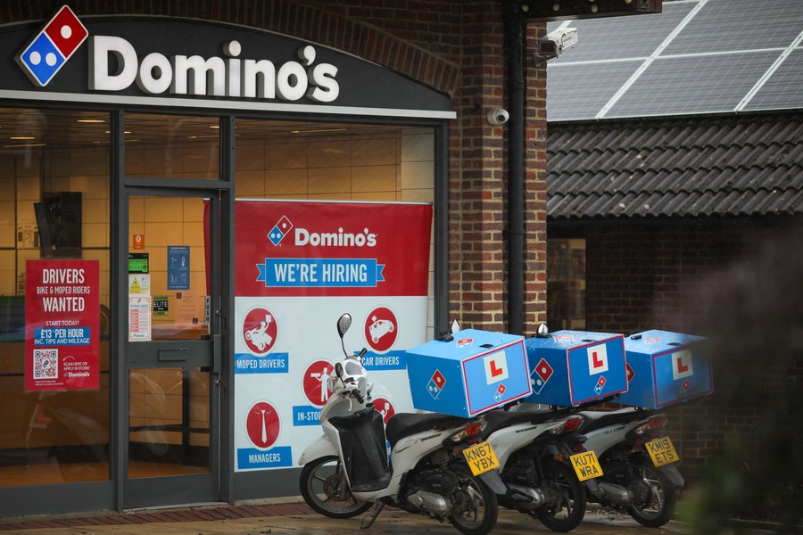 UK unemployment falls slightly as pay growth slows
