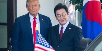 South Korean workers detained in US raid arrive home