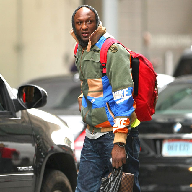 Lamar Odom was spotted getting out of an SUV and carrying a few bags in New York City on Sunday evening. Pictured: Lamar Odom Ref: SPL698368  160314   Picture by: Splash News Splash News and Pictures Los Angeles:	310-821-2666 New York:	212-619-2666 London:	870-934-2666 photodesk@splashnews.com 
