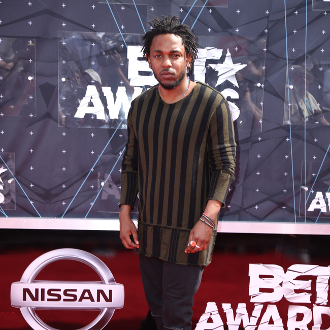 Arrival at the 2015 BET Awards in Los Angeles, California. Pictured: Kendrick Lamar Ref: SPL1066766  290615   Picture by: @Parisa/Splash News Splash News and Pictures Los Angeles:	310-821-2666 New York:	212-619-2666 London:	870-934-2666 photodesk@splashnews.com 