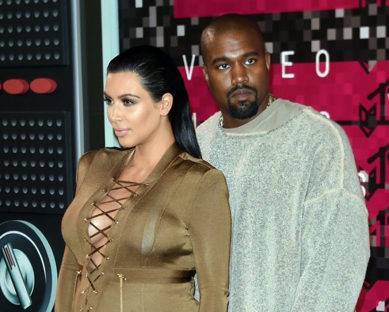 afp-kardashian-kanye-welcome-saint-to-family