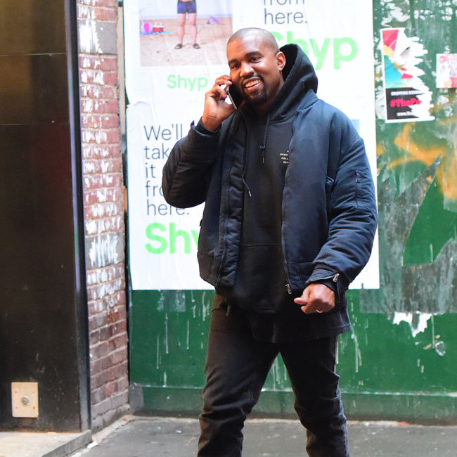 Kanye West was spotted out in NYC as he took a solo trip , away from pregnant wife, Kim Kardashian. He wore a big smile on his face as he chatted on the phone, while shopping in soho. He visited Balenciaga and Marni, looking for clothes and inspiration for his clothing line. He wore a pair of his Yeezy Boots and a Fear of God LA Bomber. Pictured: Kanye West Ref: SPL1183796  021215   Picture by: 247PAPS.TV / Splash News Splash News and Pictures Los Angeles:310-821-2666 New York:	212-619-2666 London:	870-934-2666 photodesk@splashnews.com 