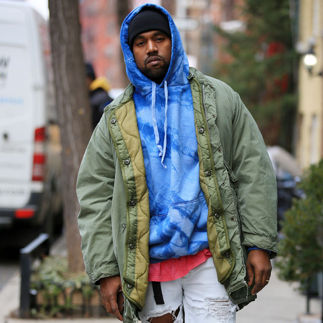 Kanye West poses for street photographs in West Village, NY Pictured: Kanye West Ref: SPL1223544  090216   Picture by: Jackson Lee / Splash News Splash News and Pictures Los Angeles:	310-821-2666 New York:	212-619-2666 London:	870-934-2666 photodesk@splashnews.com 