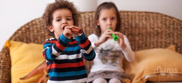 children-blowing-flutes-370x168