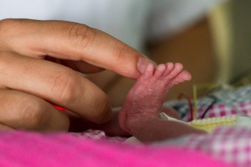 INDIAN WOMAN GIVES BIRTH AT 70