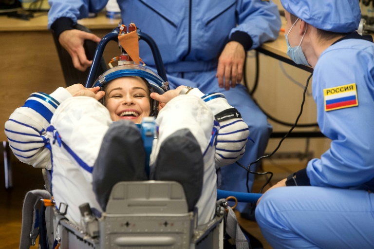 Russians return to Earth after filming first movie in space