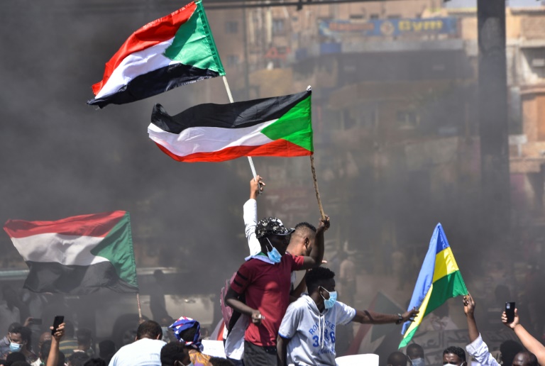 Security tightens grip in coup-hit Sudan as global pressure bites