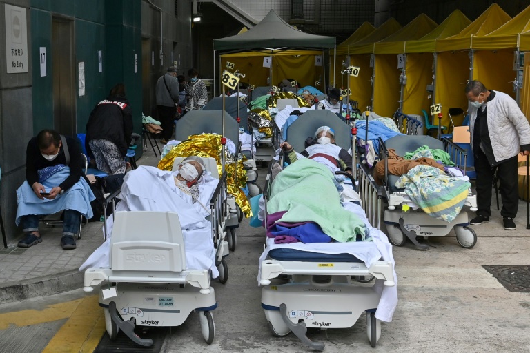 Hong Kong leader rules out China-style lockdown as virus spreads