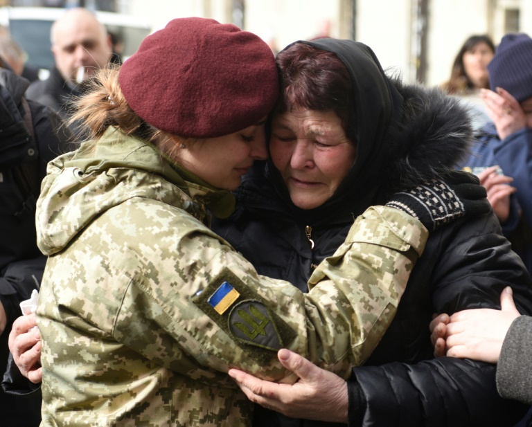 ‘We will win’: Ukraine families mourn their fallen soldiers