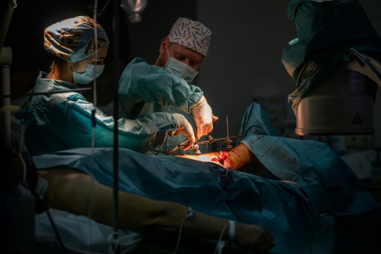 For Ukraine doctors, treating injured Russians a necessary evil