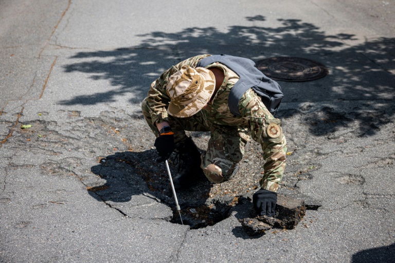 In Kharkiv’s Gorky Park, a war crimes investigation
