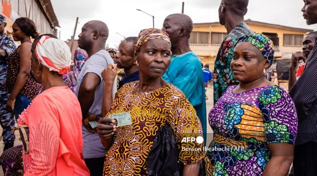 Nigerians vote for new president in a tight election