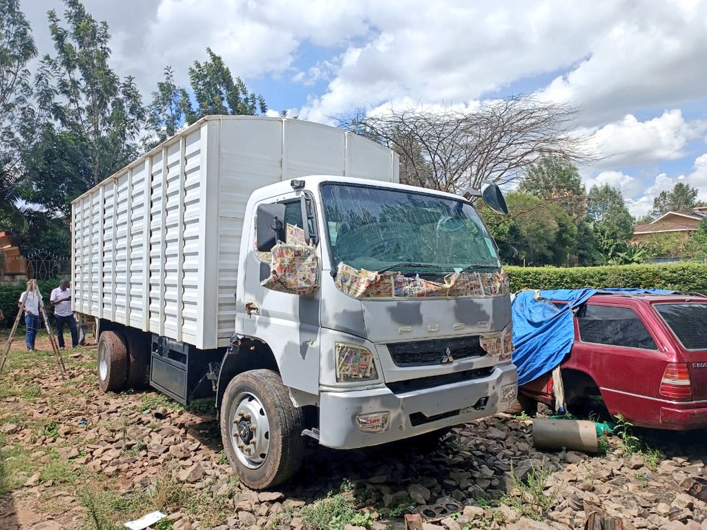 Stolen lorry recovered at a garage in Karen undergoing identity change