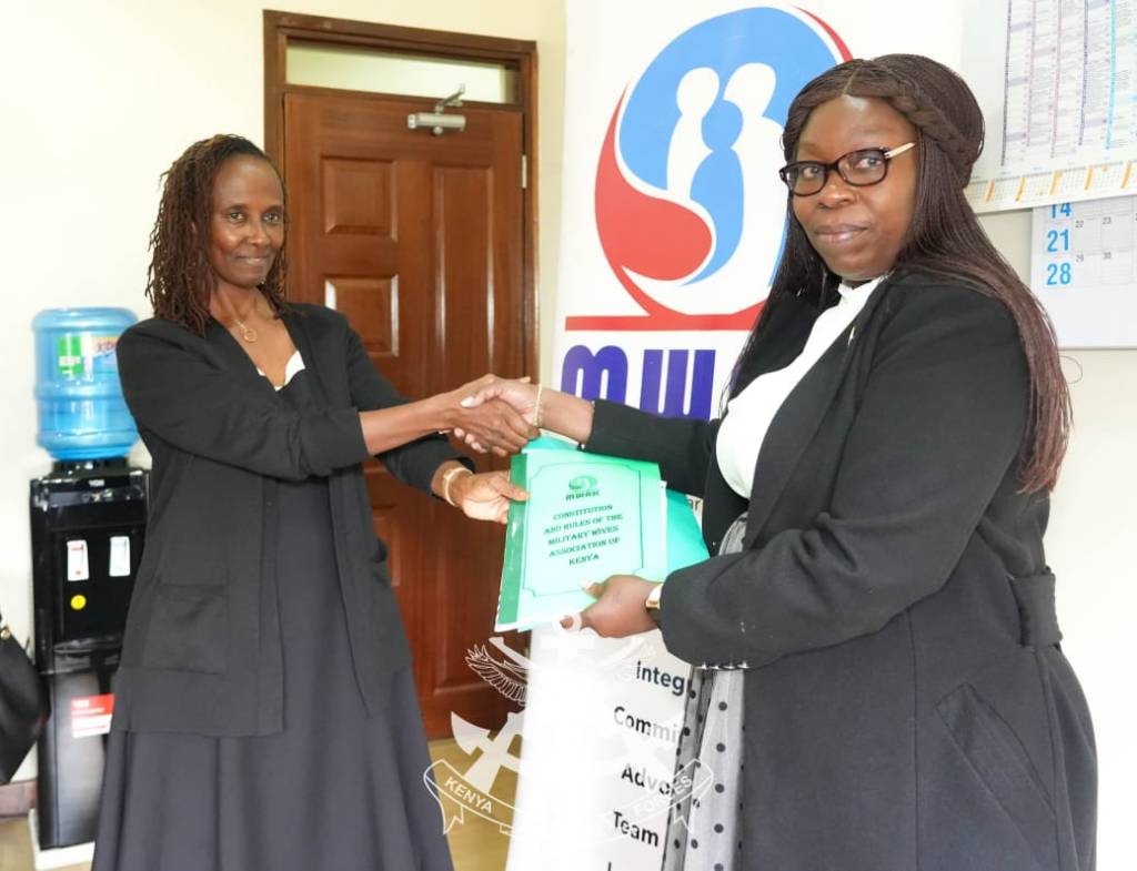 Aileen Ogolla hands Grace Kahariri baton in Military Wives Association transition