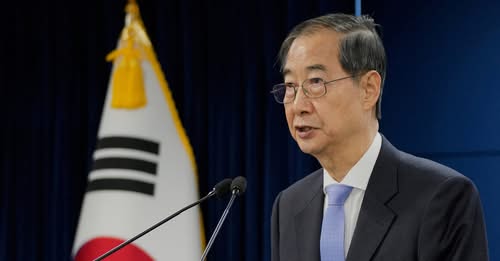 South Korea court reinstates PM as acting leader