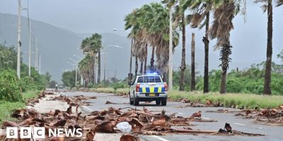 Jamaicans wake to devastation as hurricane causes floods, power cuts and splits city in two