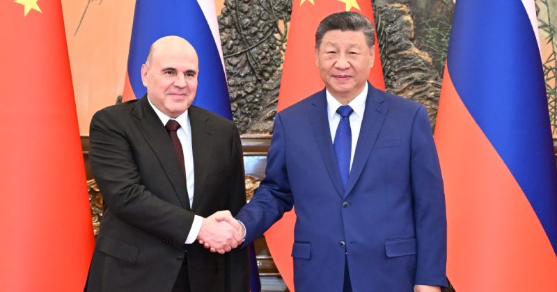 Xi meets Russian PM in Beijing