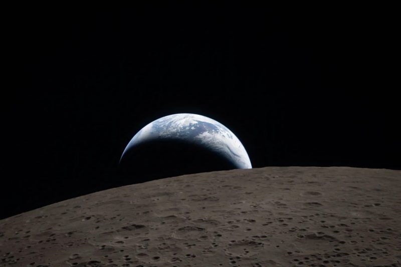 Earthset and a solar eclipse: Nasa releases first images from Moon fly-by