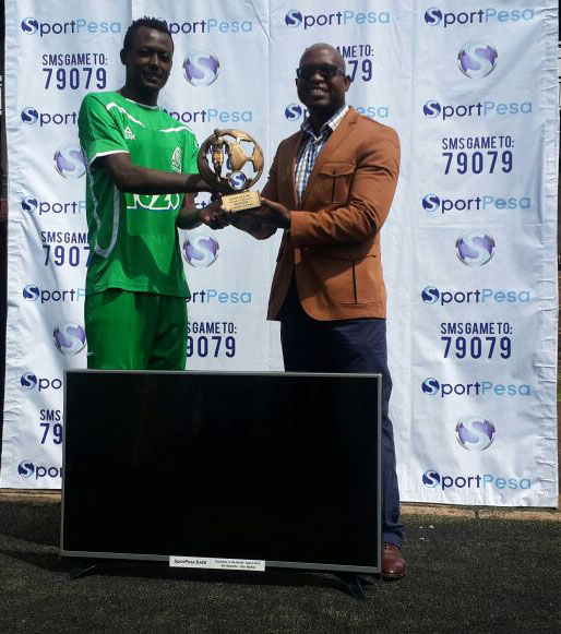 Gor Mahia midfielder Ali Abondo receives the March 2014 SJAK Footballer of the Month Award. PHOTO/File