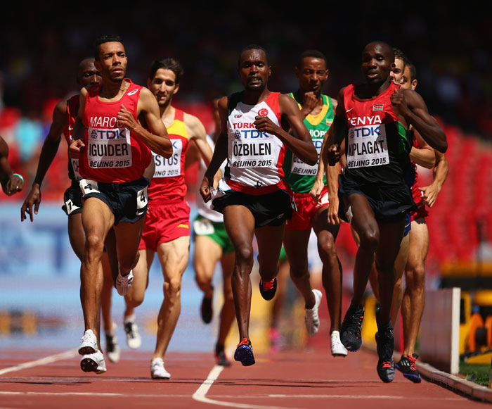 Silas KIplagat (right) wins his men 1500m heat in Beijing on August 27, 2015. PHOTO/IAAF/Getty Images