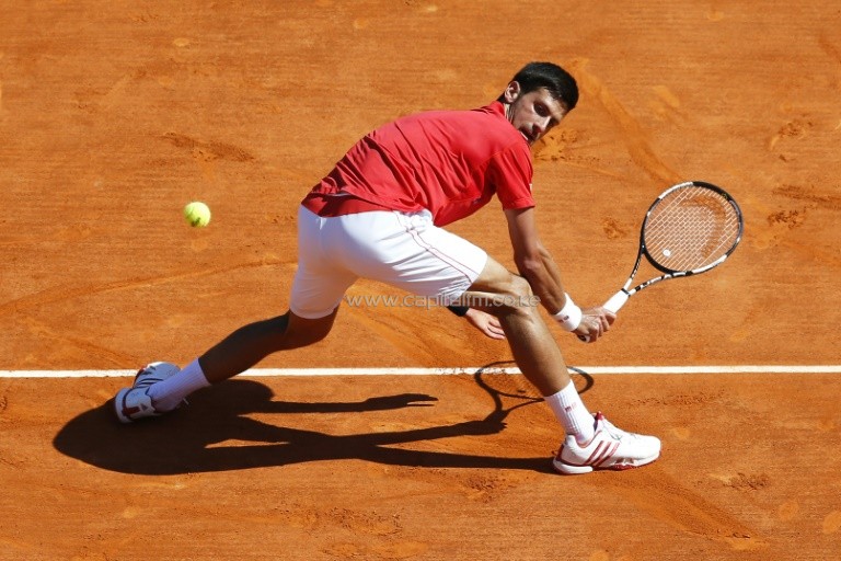 Serbia's Novak Djokovic in action against Czech Republic's Jiri Vesely at the Monte Carlo Masters, April 13, 2015. PHOTO/AFP.